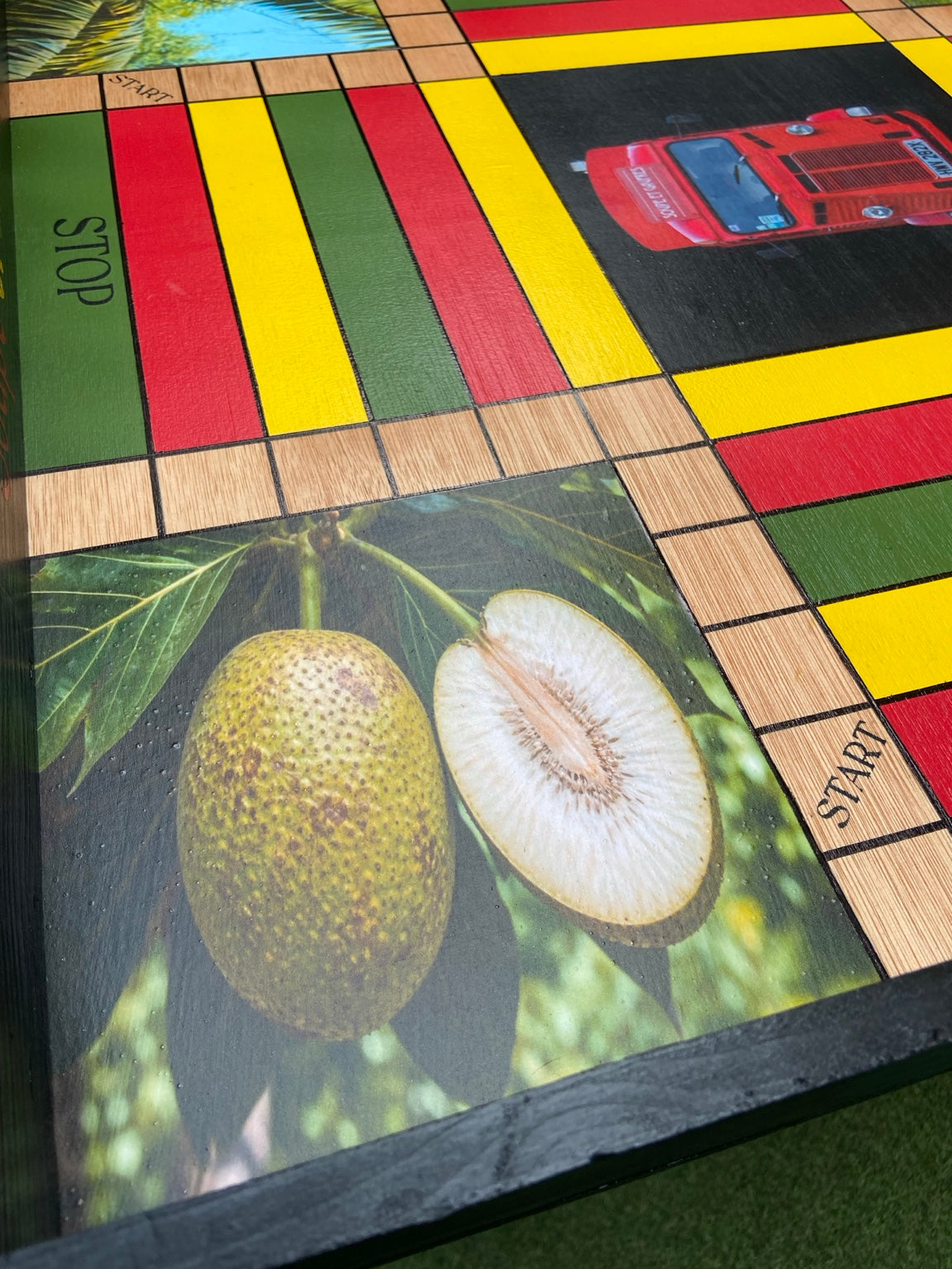 Breadfruit photograph detail on custom Ludi board
