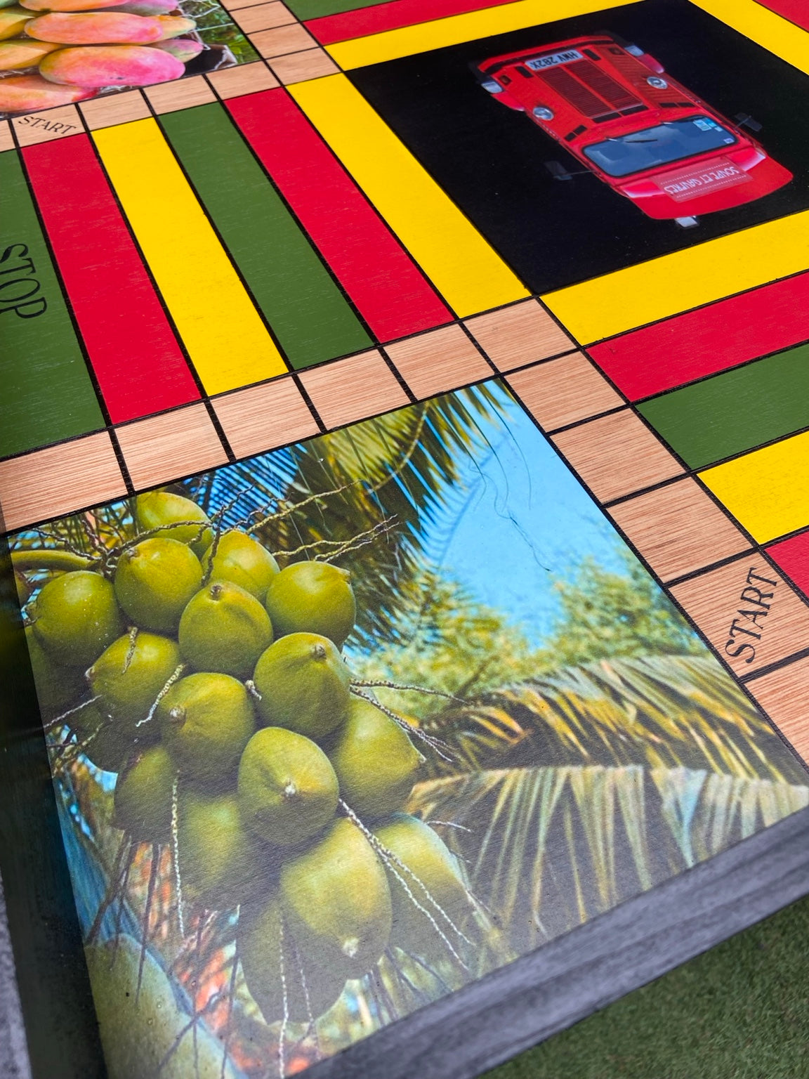 Coconut tree photograph detail on custom Ludi board