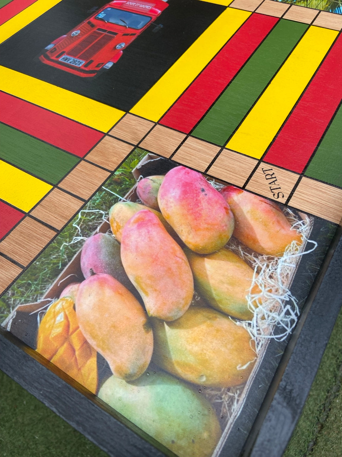 Mango photograph detail on custom Ludi board